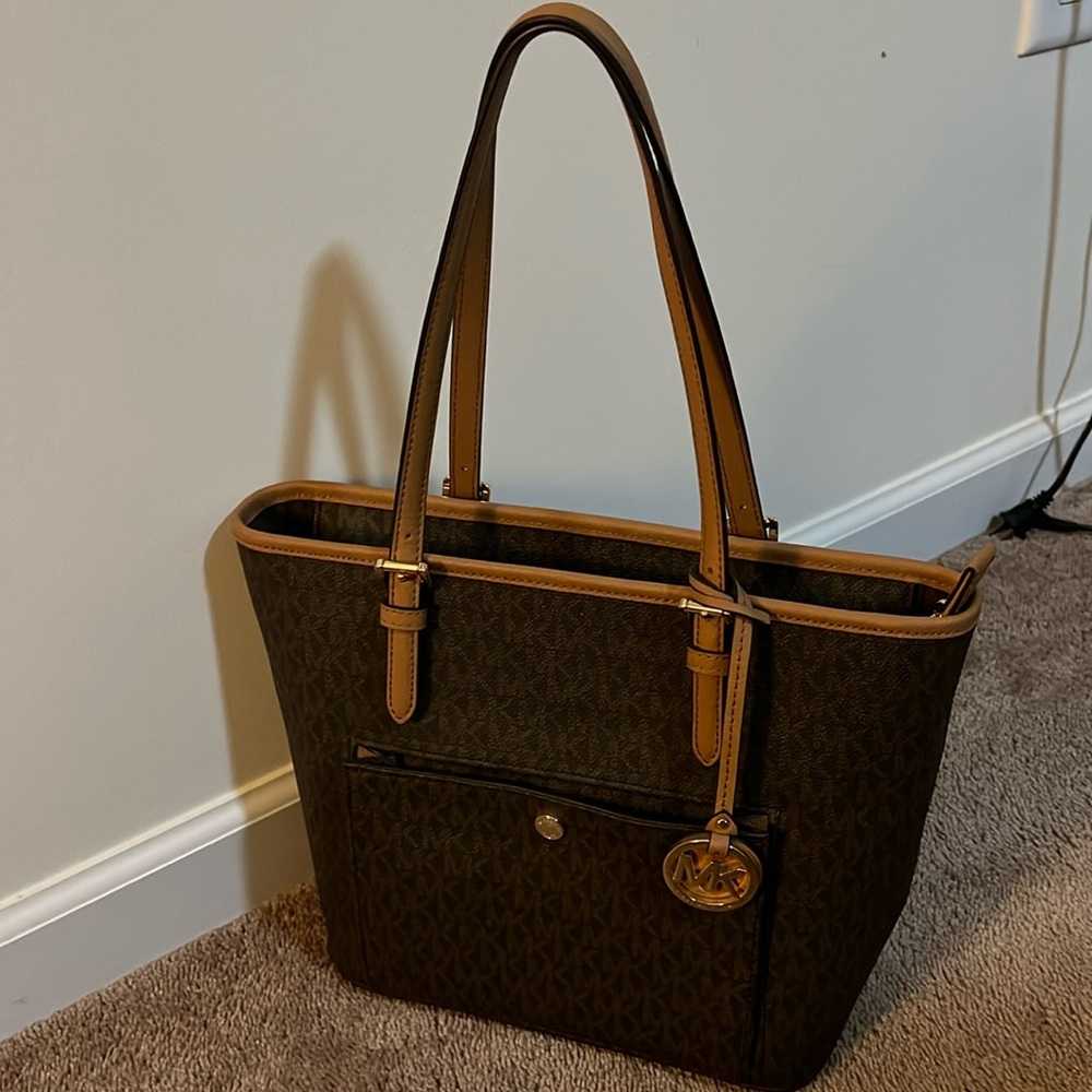 Michael Kors purse new with tags , no smoking no pets home.